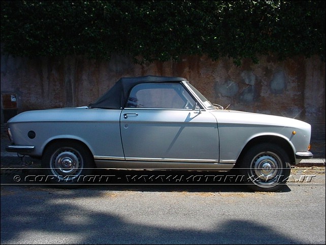 http://www.motorimania.it/manifestazioni/sportive/images_peugeot/a_peugeot_304_cabrio_31.jpg